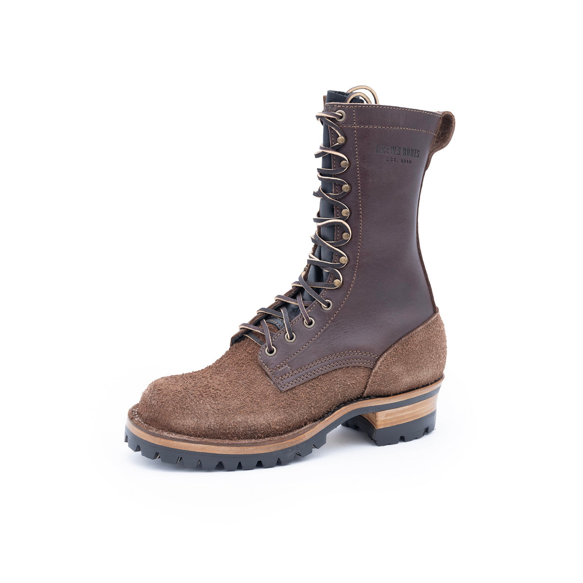 Brown leather boot with a textured sole on a white background