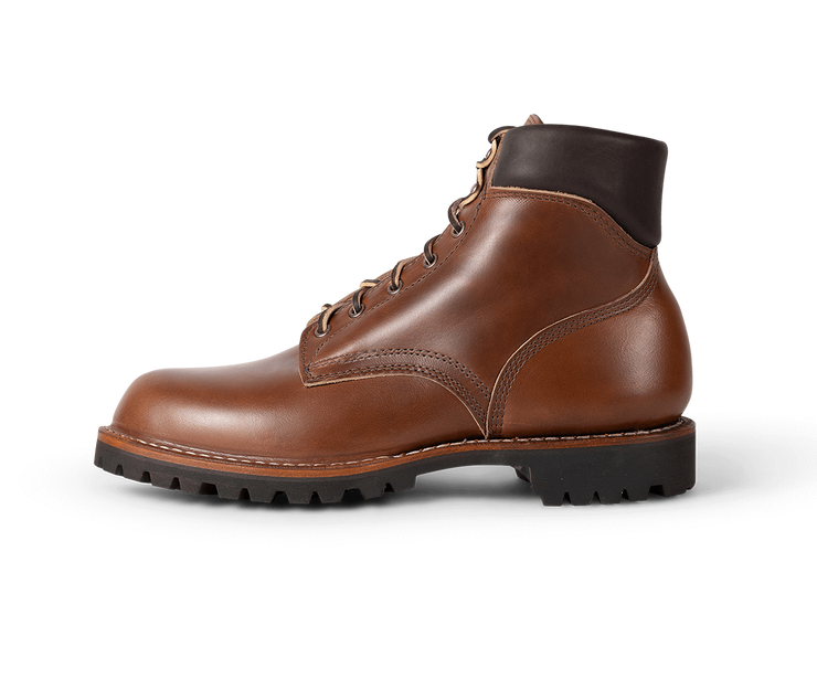 White hiker deals boot